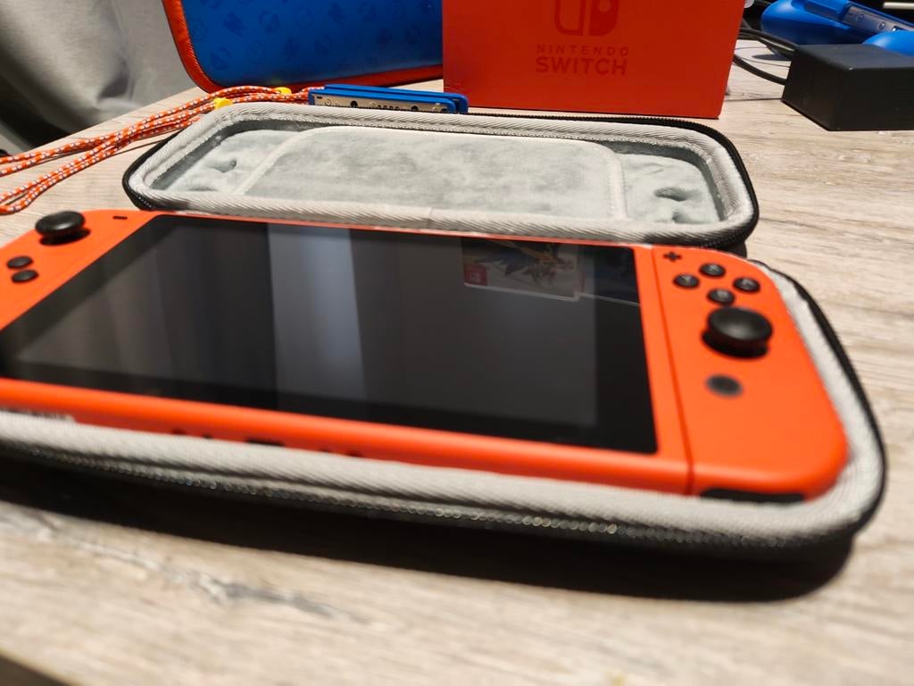 Switch console mario editie(V2) met Pokémon & Ring Fit game, Switch 2019 Upgrade, Comme neuf, Enlèvement, Avec jeux