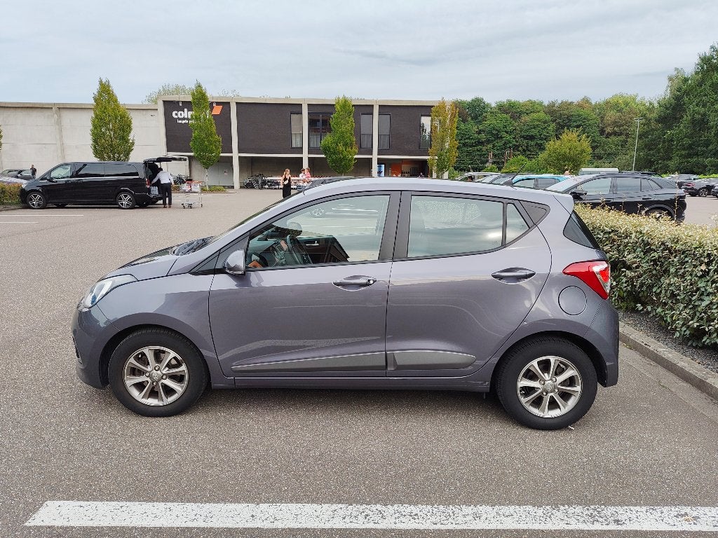 Hyundai i10 - 71.273 km - inschrijvingsjaar 2016, Auto's, Stof, Bluetooth, Bruin, Particulier