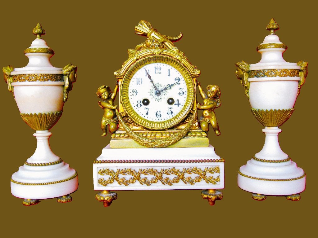 19 eeuwse wit marmeren pendule met cassaulettes, Enlèvement