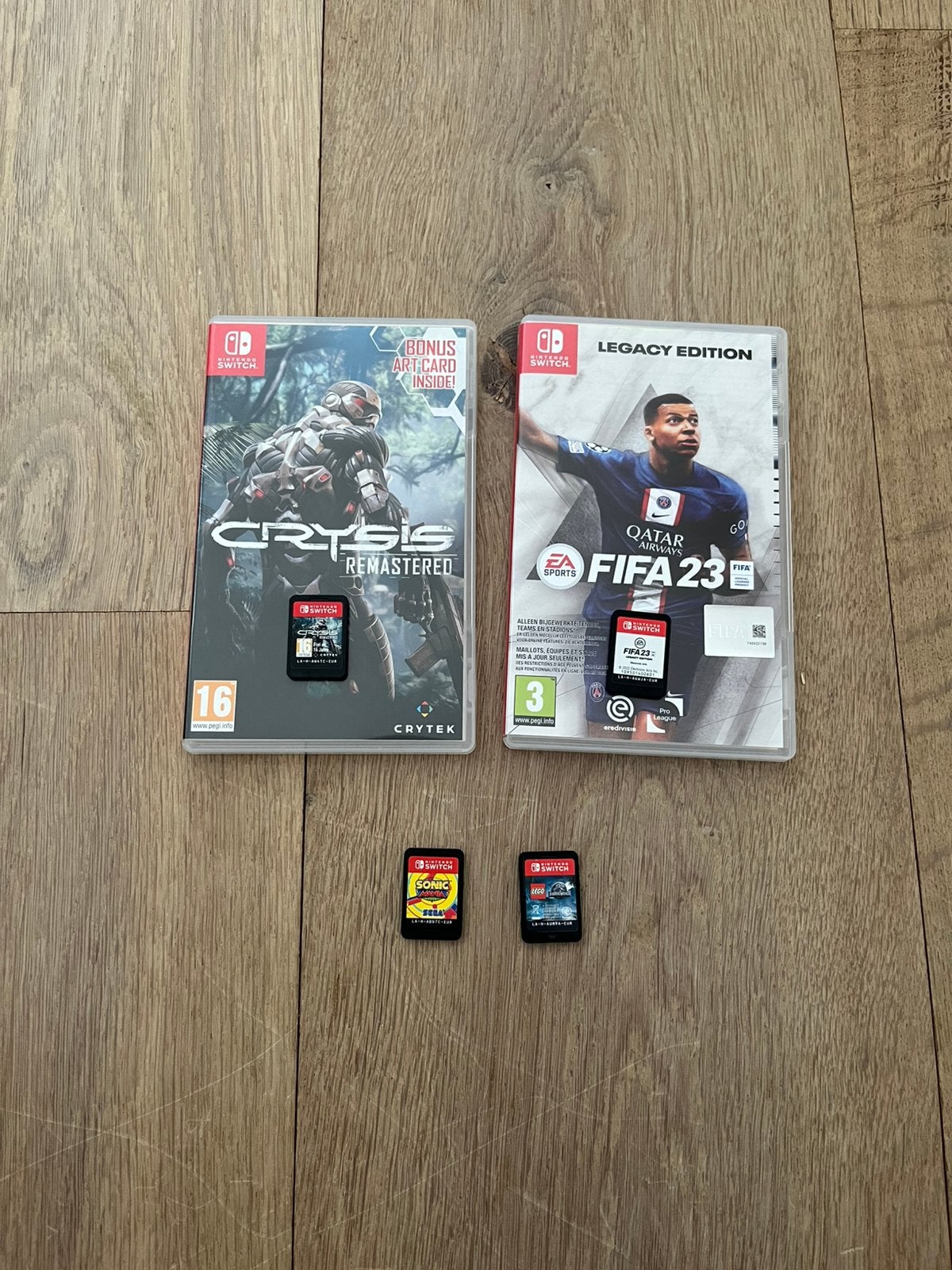4 Nintendo Switch Games: Crysis, FIFA 23, Sonic & Lego, Enlèvement, Comme neuf