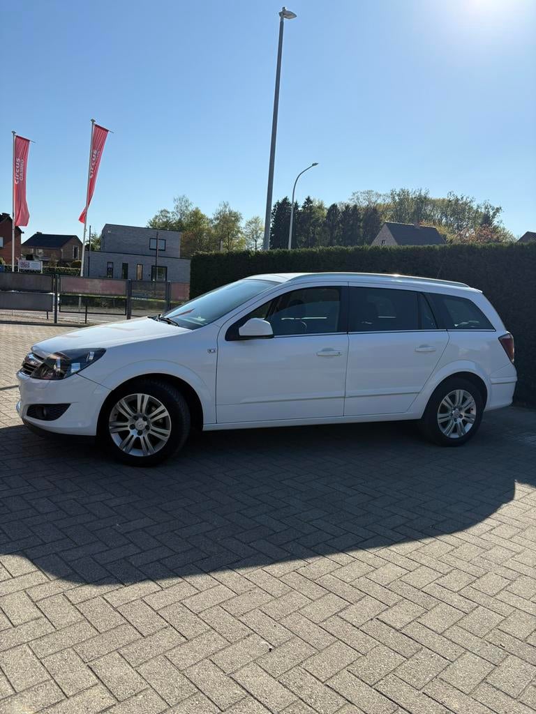 Opel Astra Break 1.4 clime essence navi — 2009 — 184 000 km, Autos, Cuir, Achat, Entreprise, Boîte manuelle