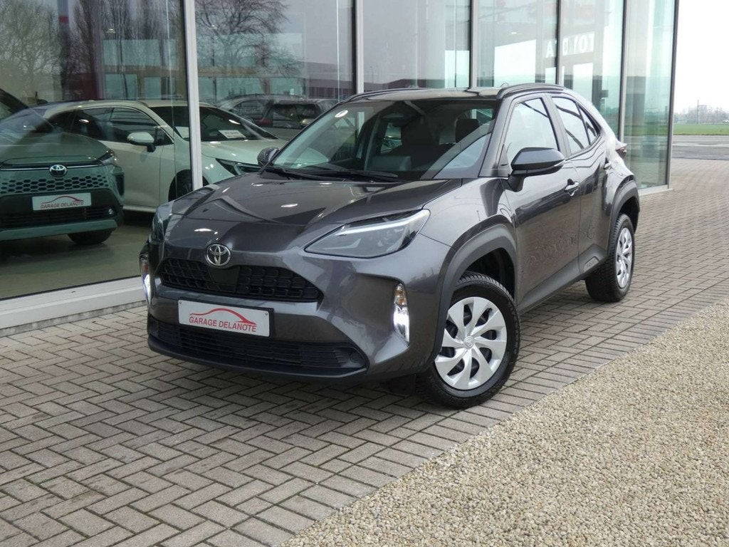 Toyota Yaris Cross 1.5i HYBRID Dynamic +Apple Carplay +Andro, Auto's, Toyota, Stof, Gebruikt, Zwart, 1490 cc