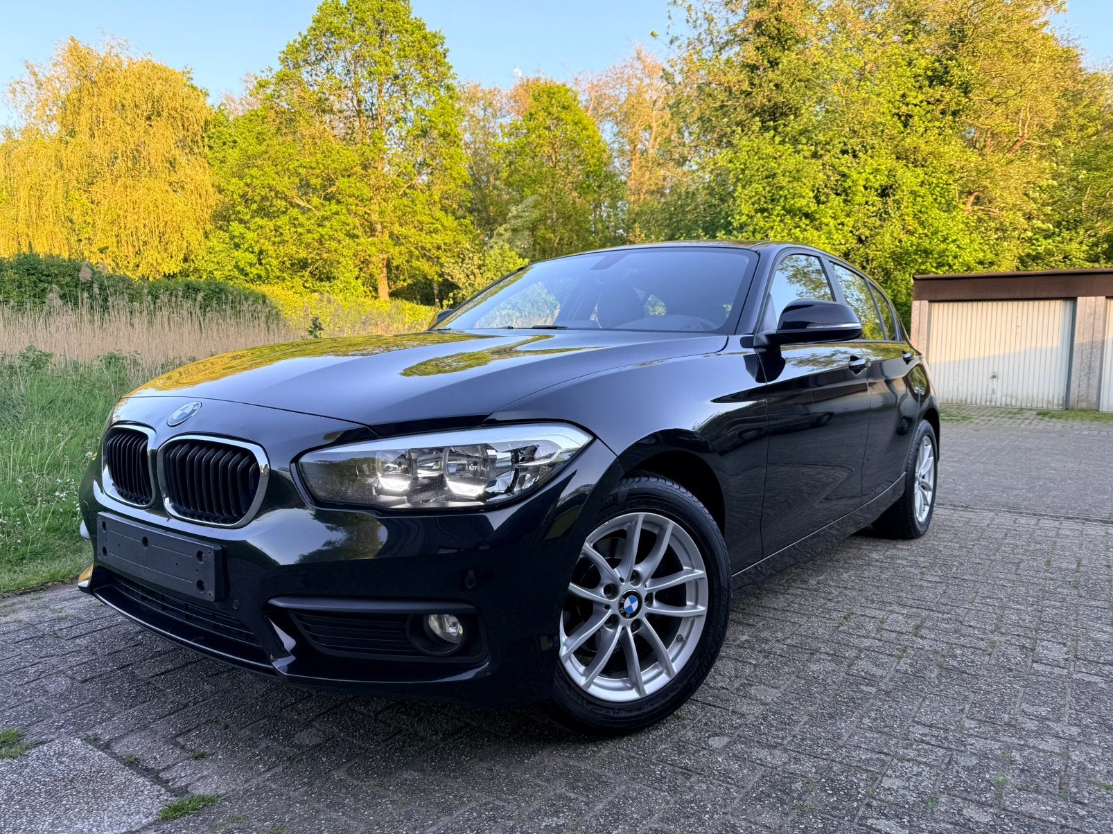 BMW 118i - 2019 - Euro 6 - Garantie, Auto's, BMW, 100 kW, 4 deurs, Zwart, Leder