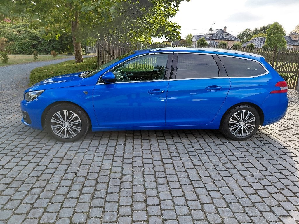 Peugeot 308 SW1.3 130 pk automaat, Auto's, Dealer onderhouden, 1199 cc, Blauw, Leder en Stof