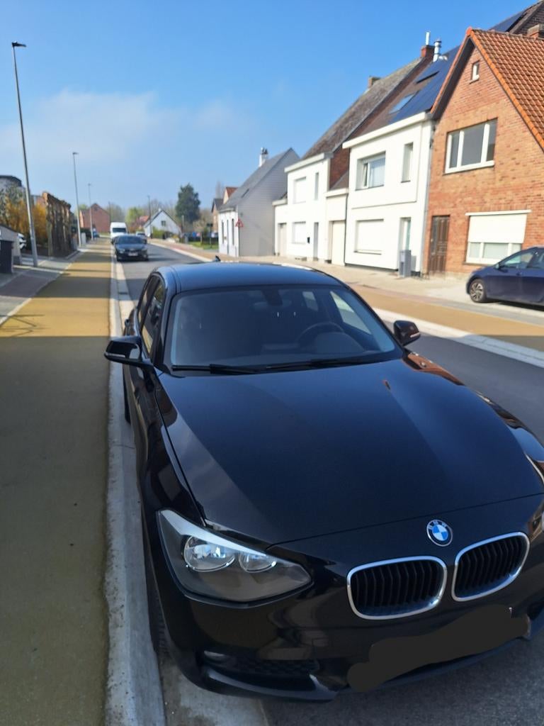 BMW 1-reeks checkered flag edition 114i, 4 cilinders, Zwart, Particulier, 1 Reeks