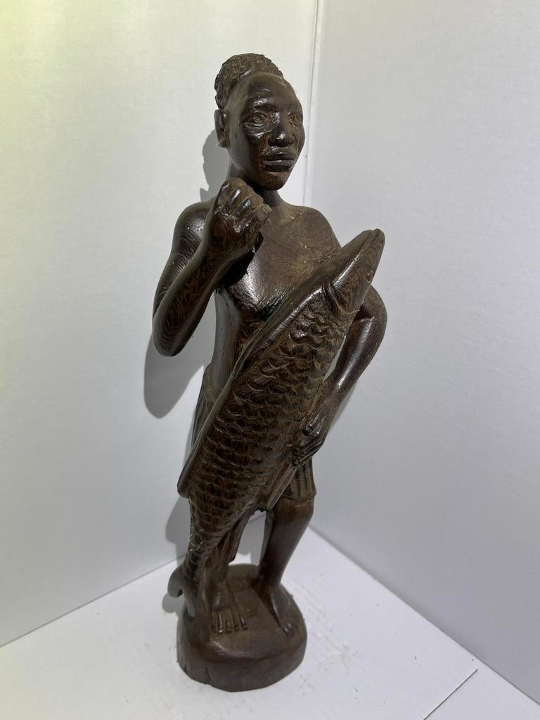 handgesneden houten beeld van een Afrikaanse visser, Ophalen