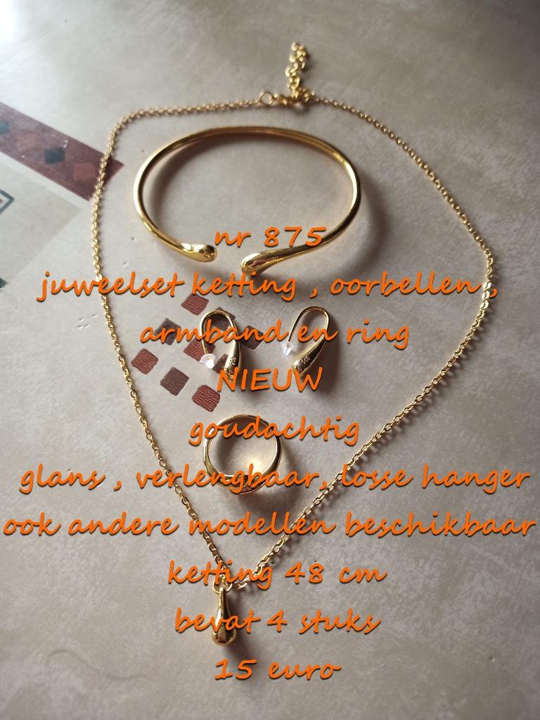 875. Parure de bijoux : collier, boucles d'oreilles, bracele, Neuf, Or, Autres matériaux, Avec pendentif