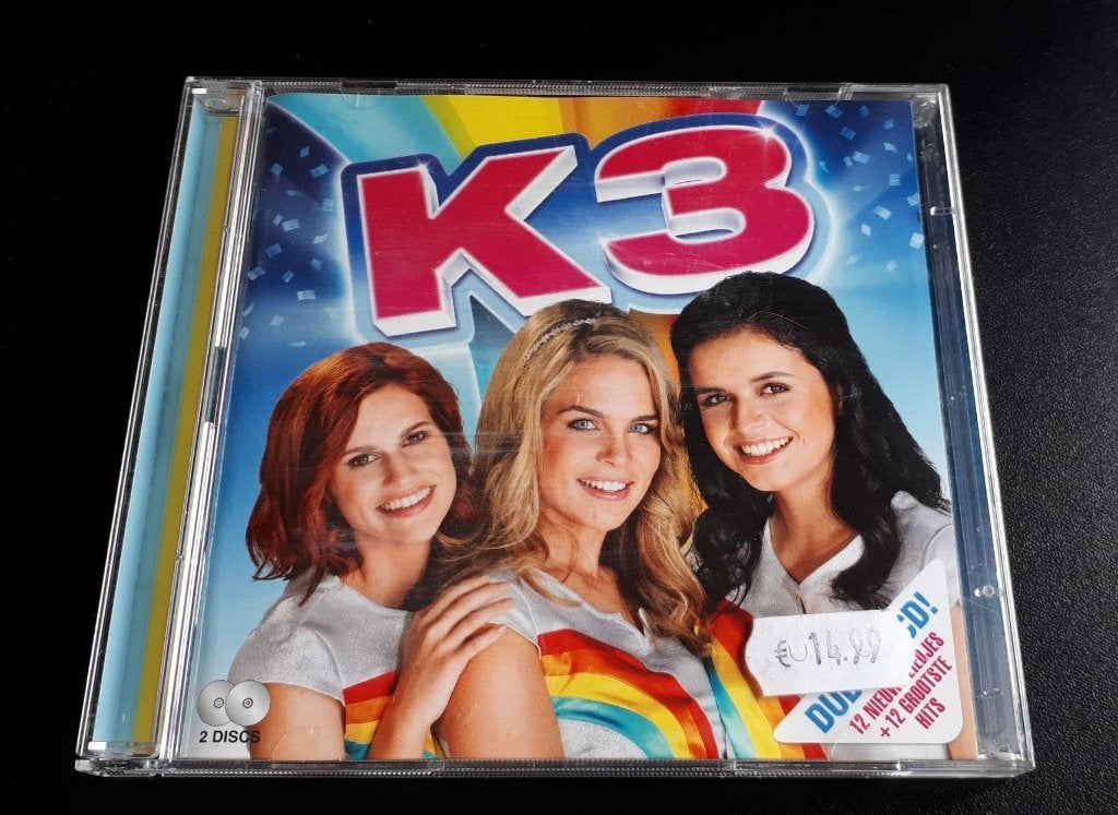Dubbel CD - K3 - 10 000 luchtballonnen -Hanne/Klaasje/Marthe, Comme neuf, Musique, Envoi, Comprend un livret