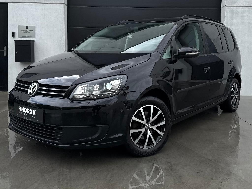 Volkswagen Touran 1.6 TDi 7pl. - Navi - PDC - Cruise - GRNTI, Autos, Volkswagen, Euro 5, Entreprise, Boîte manuelle, Entretenue par le concessionnaire
