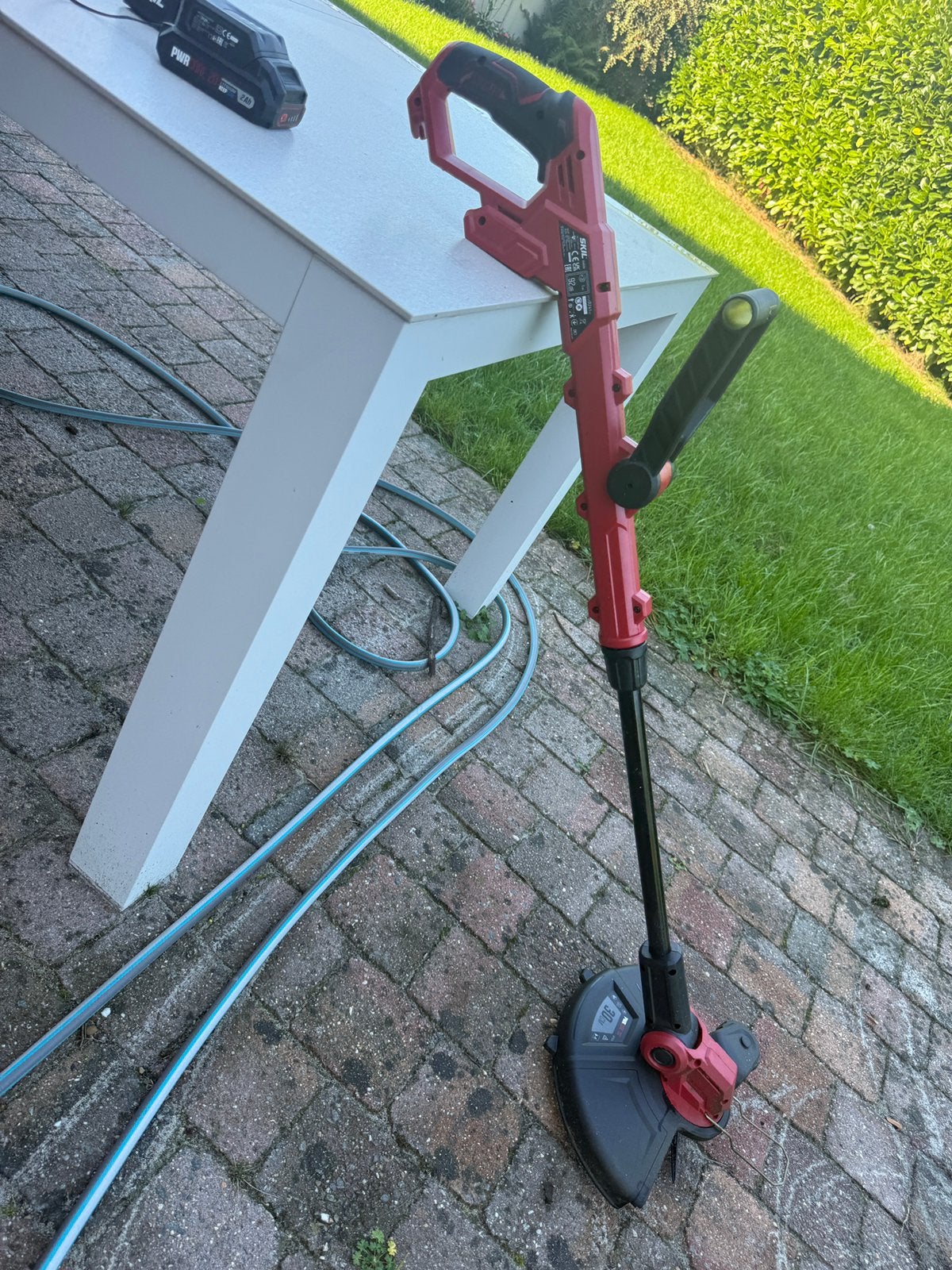 SKIL  grastrimmer 30cm brushless, Tuin en Terras, Ophalen, Gebruikt, 30 tot 50 cm, Accu