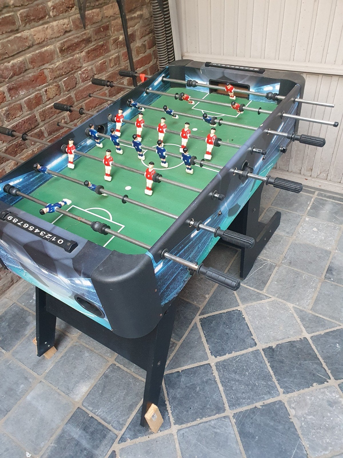 voetbaltafel, Ophalen