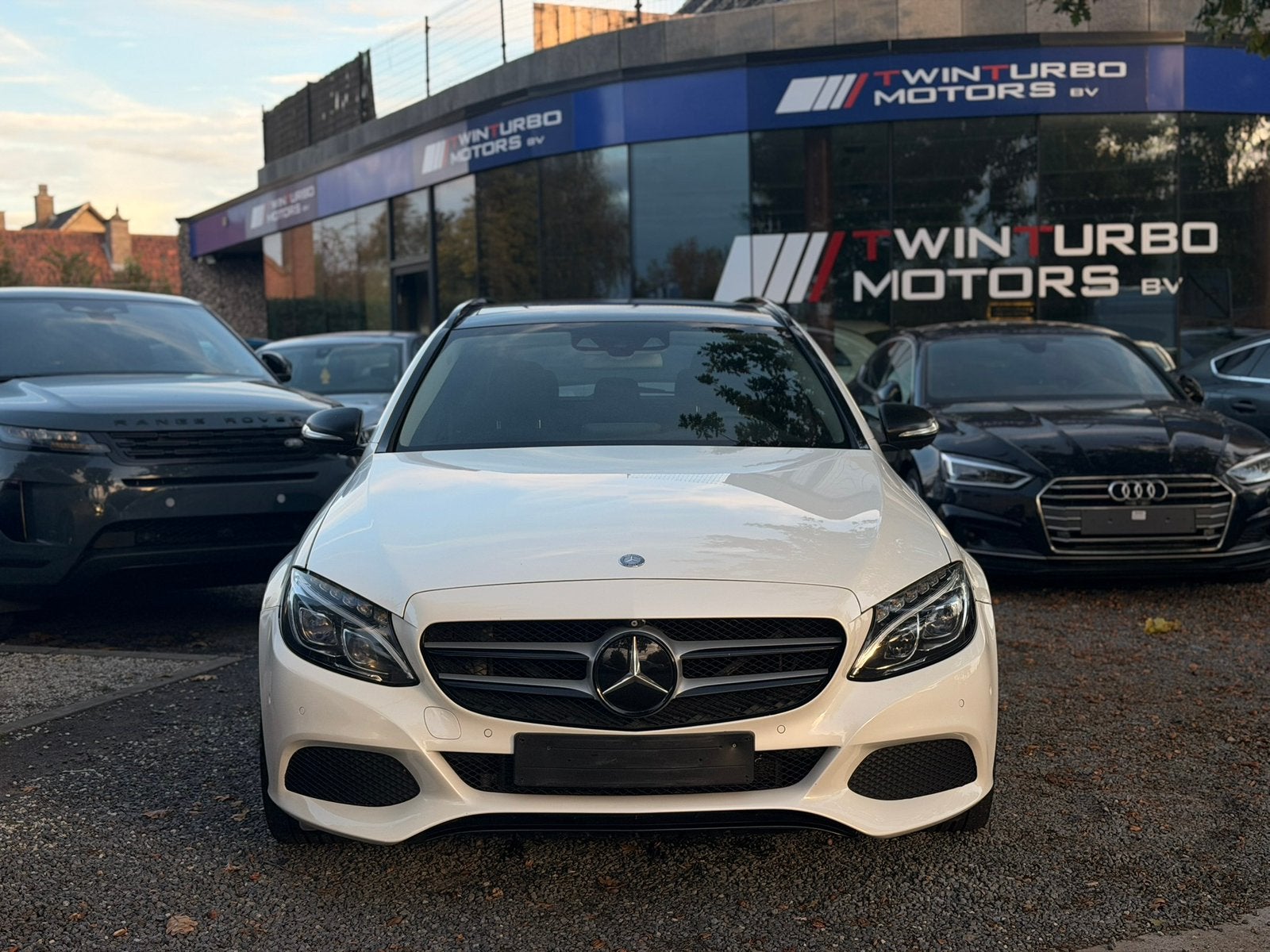 Mercedes c350e Benzine Hybride, Auto's, Verwarmde buitenspiegels, 4 cilinders, Wit, Leder