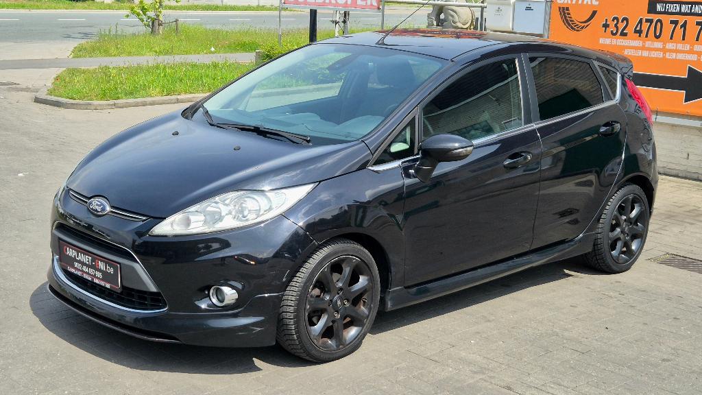 Ford Fiesta 2013 - 1.25cc 4cilinder Benzien 82pk-no EcoBoost, Auto's, Ford, Voorwielaandrijving, Euro 5, Stof, Zwart