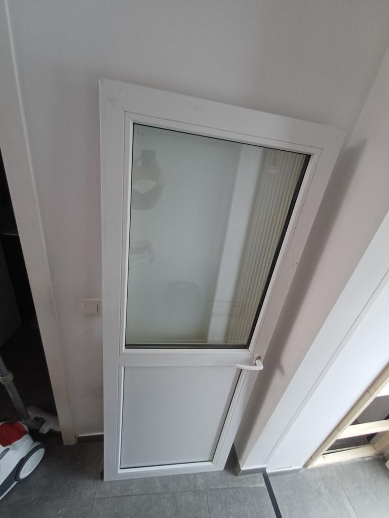 Porte en PVC moitié verre moitié PVC, Enlèvement