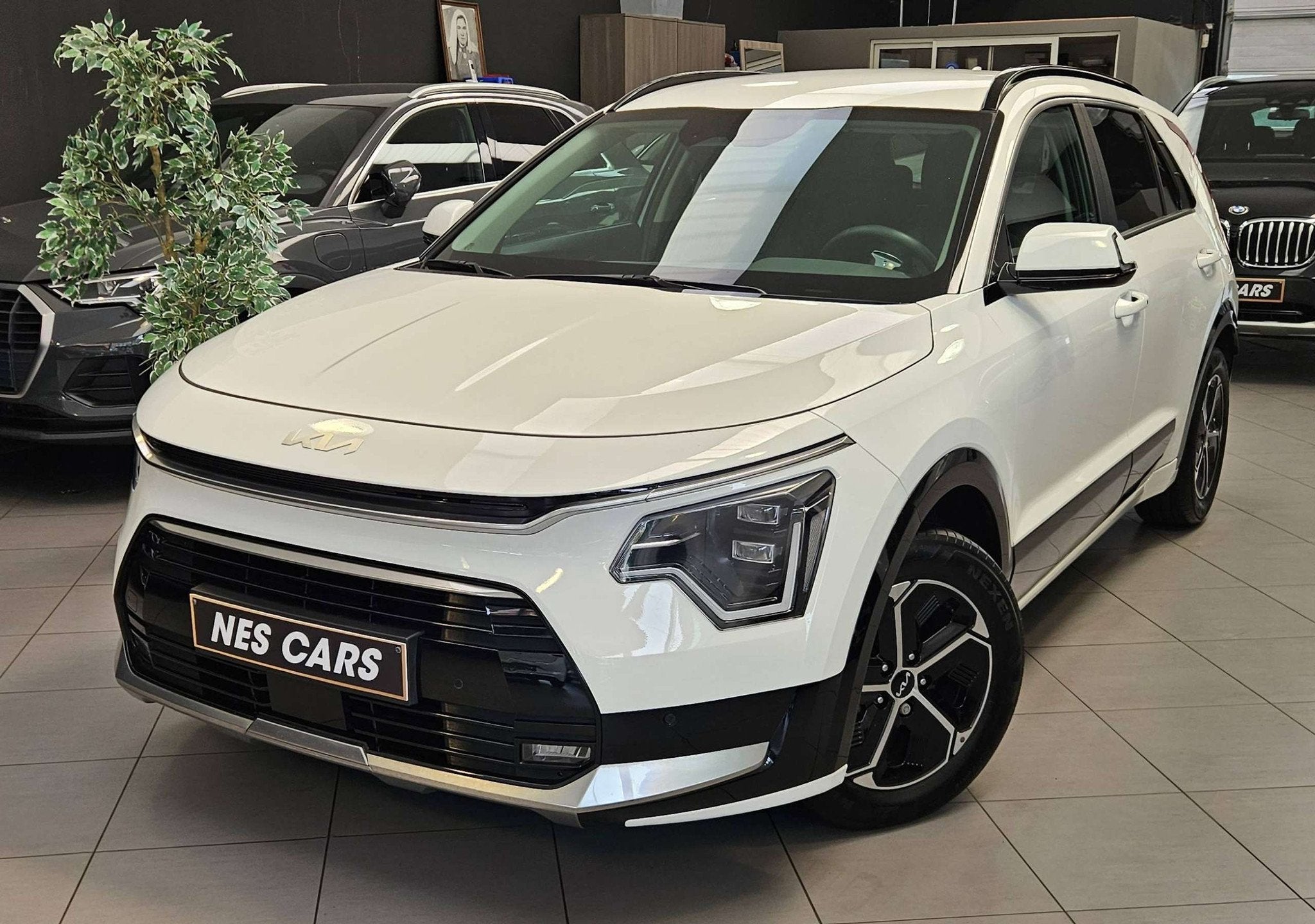 Kia Niro NIRO HEV 1.6 GDi PULSE,SEMI-CUIR,GPS,CAMERA,GARANTI, Auto's, Kia, Parkeersensor, 105 pk, Gebruikt, Wit