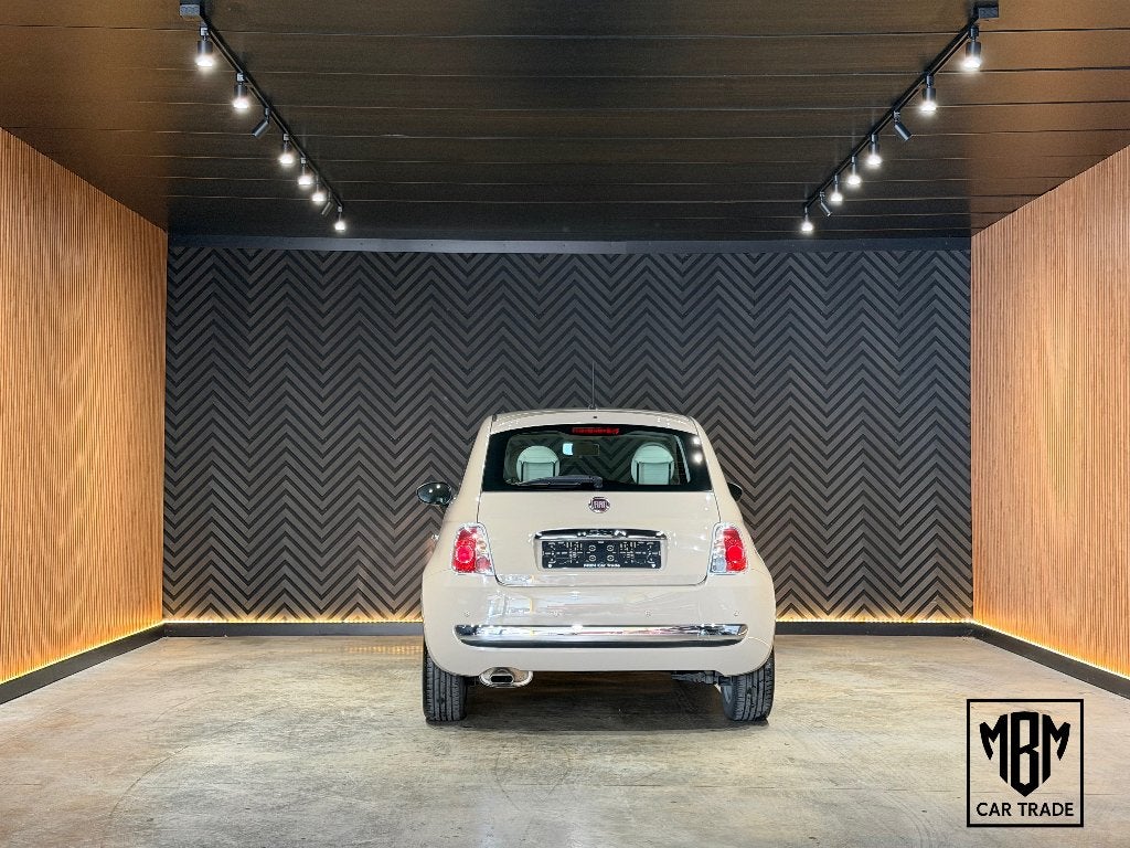 ✅Fiat 500 1.2i Lounge 12 Maanden GARANTIE Pano Airco Parksen, Auto's, Voorwielaandrijving, Stof, 4 cilinders, Beige