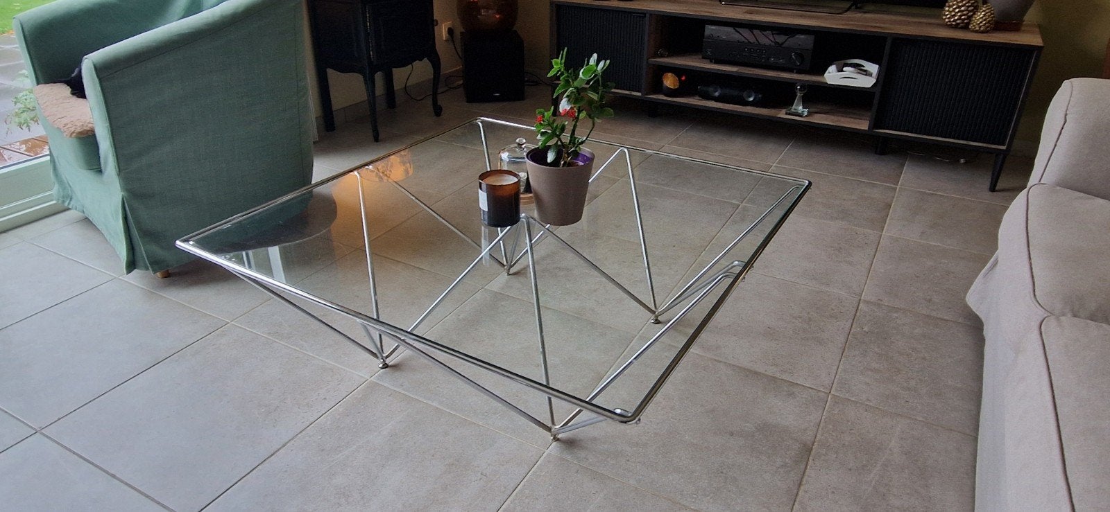 salontafel van roestvrij staal en gehard glas., Ophalen