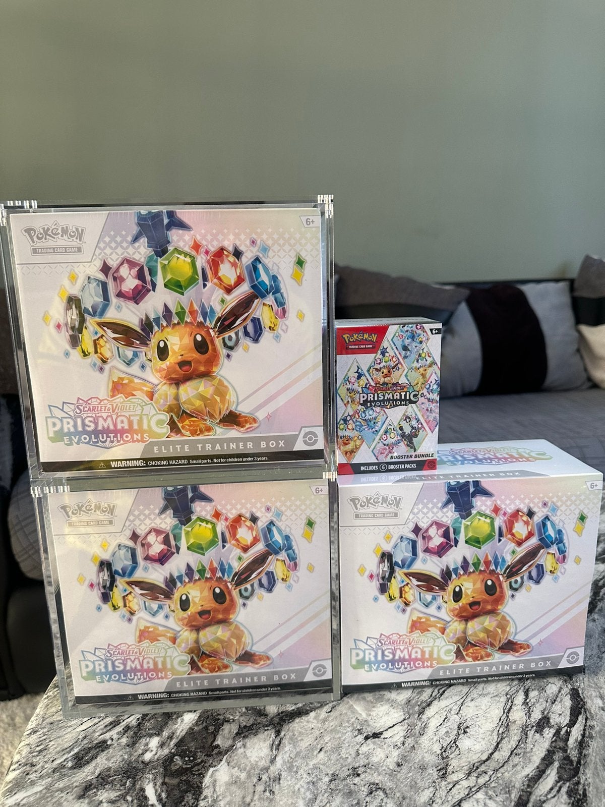 3 Prismatic Evolutions ETB's en Booster Bundel, Hobby en Vrije tijd, Verzamelkaartspellen | Pokémon, Ophalen, Nieuw, Booster