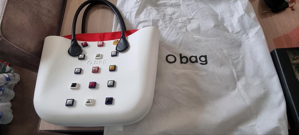 Handtas O'Bag, Ophalen