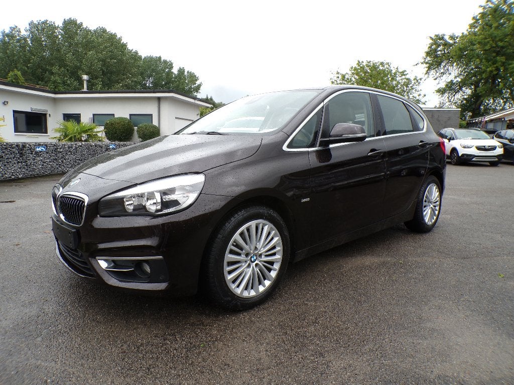 BMW 218i Active Tourer Automaat/Navi/Leder/Garantie, Auto's, Zwart, Bedrijf, 5 deurs, 3 cilinders