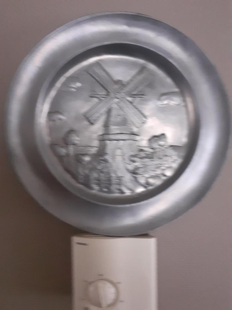 Tinnen bord, Ophalen