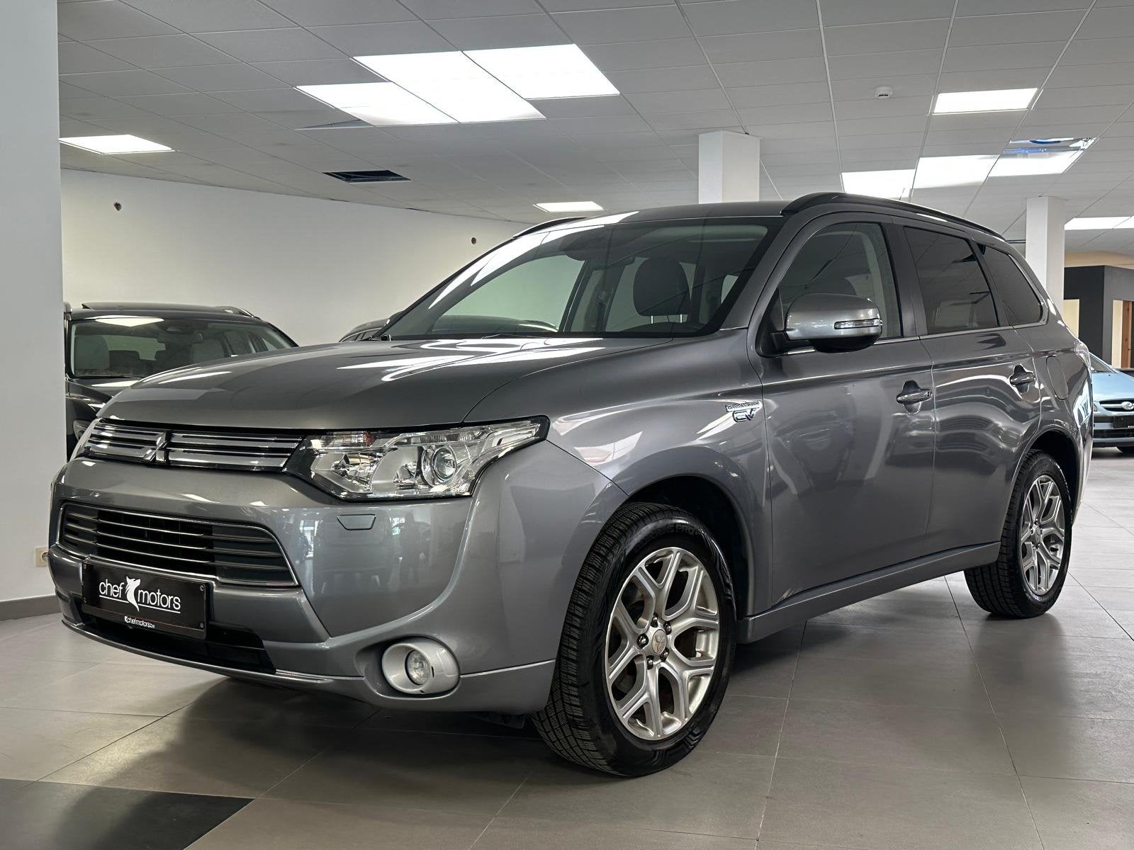 Mitsubishi Outlander 2.0 PHEV 4WD, Auto's, Automaat, 4 cilinders, Bedrijf, 5 zetels