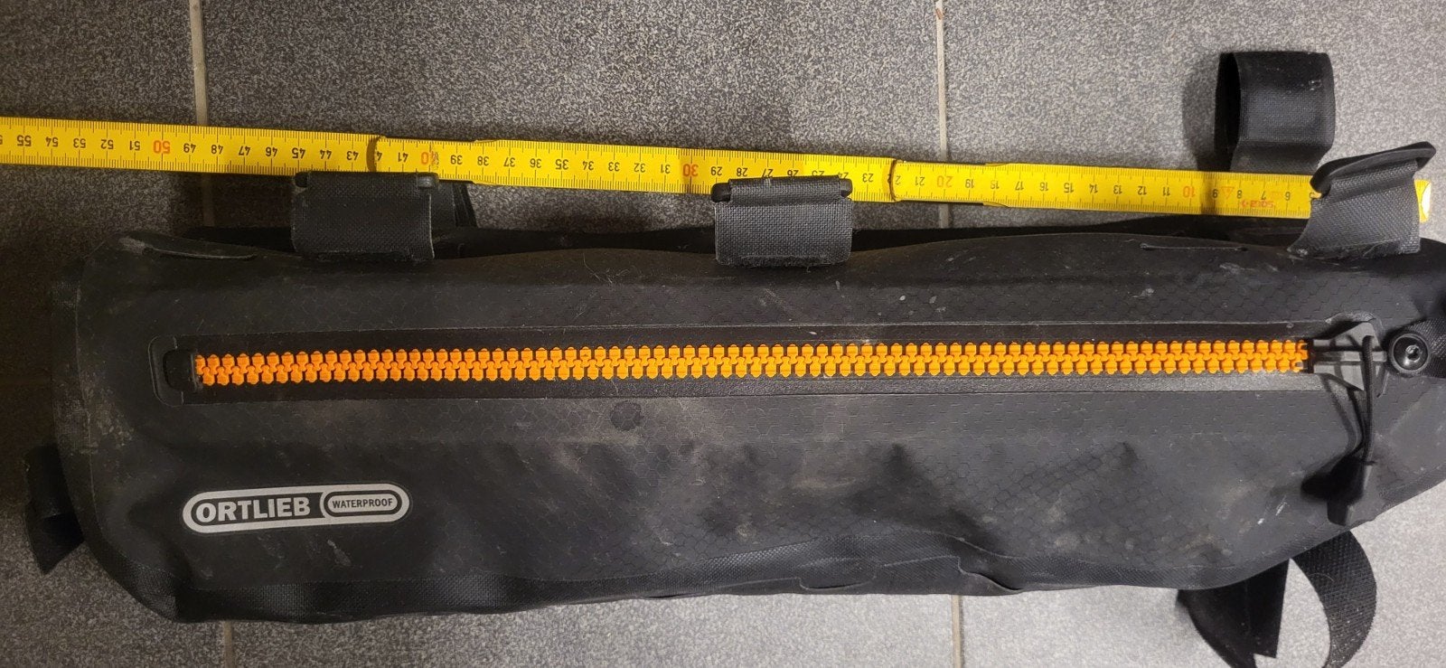 Ortlieb frame-pack toptube, Enlèvement