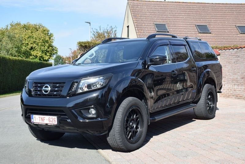 Nissan Navara dCi N-Guard Double Cab AUT, Auto's, Automaat, Gebruikt, 4 cilinders, Leder en Stof