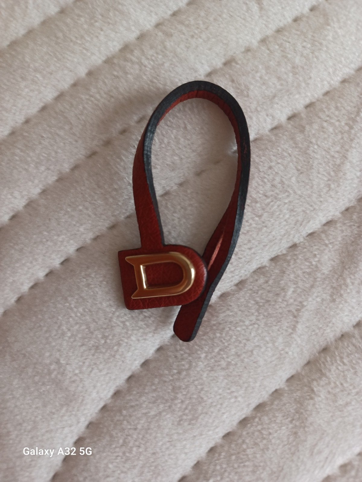 DELVAUX Griffe pour sac ROSSO siglée, Verzenden