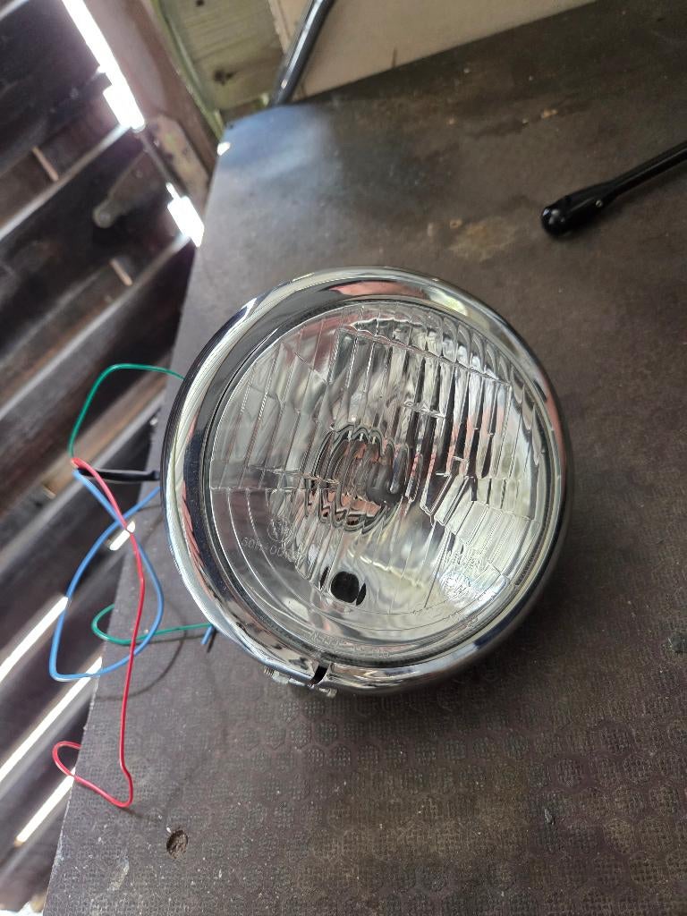 Nieuwe zwarte harley koplamp.zie foto's, Motoren, Ophalen, Nieuw