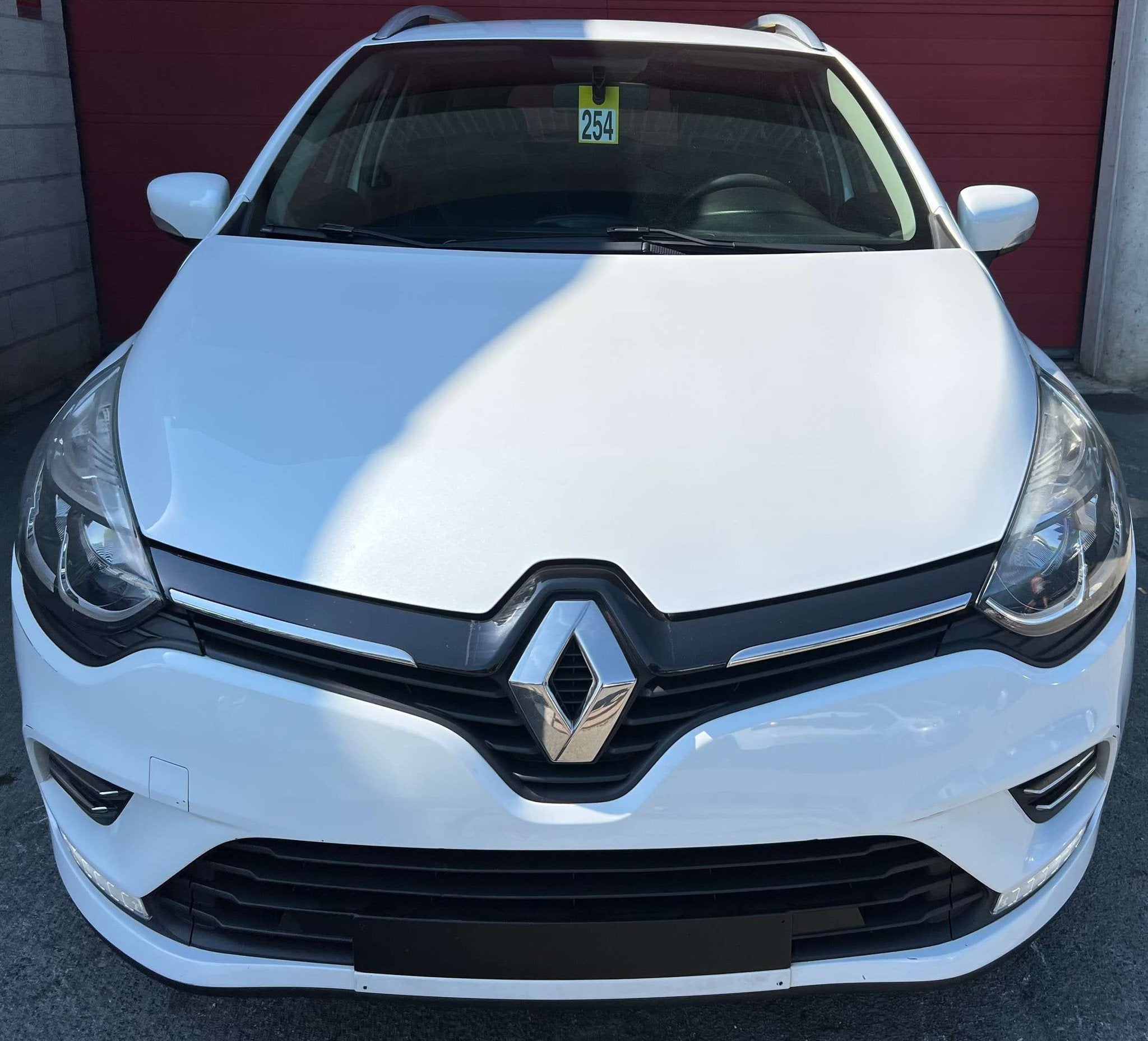 Renault Clio 1.2i Limited + CLIM + NAVIGATION (bj 2017), Auto's, Gebruikt, Euro 6, 4 cilinders, Wit