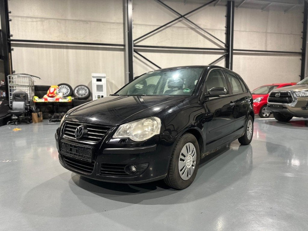 Polo 1.2 Tour (2006) I EXPORT | Airco I sièges chauffants, Achat, Boîte manuelle, Noir, 5 places