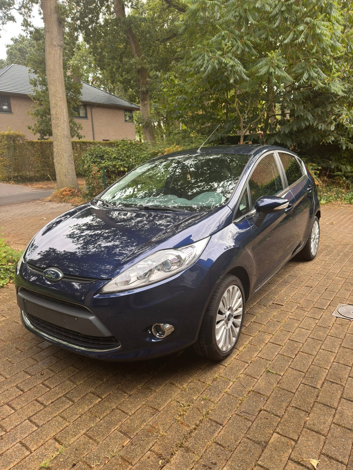 Ford Fiësta 1.2 bezine manueel bouwjaar 2010, Auto's, Euro 5, Stof, Zwart, 4 cilinders