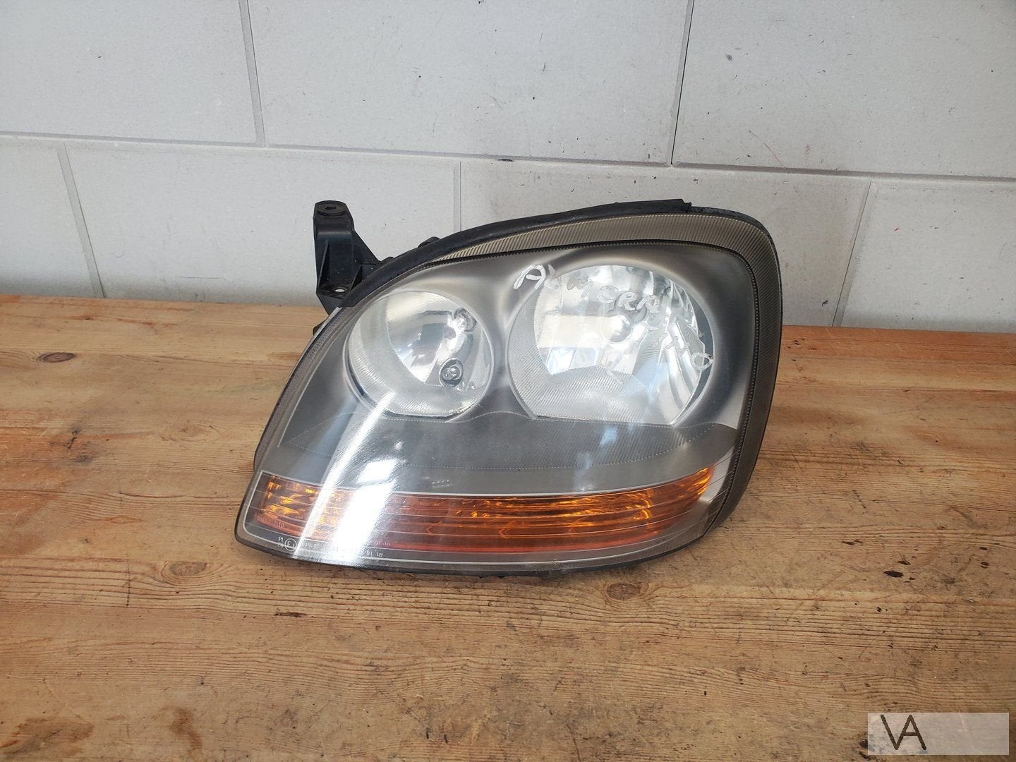 Nissan Almera Tino 2000 - 2007 koplamp links oranje knipper, Gebruikt, -, -, Ophalen of Verzenden
