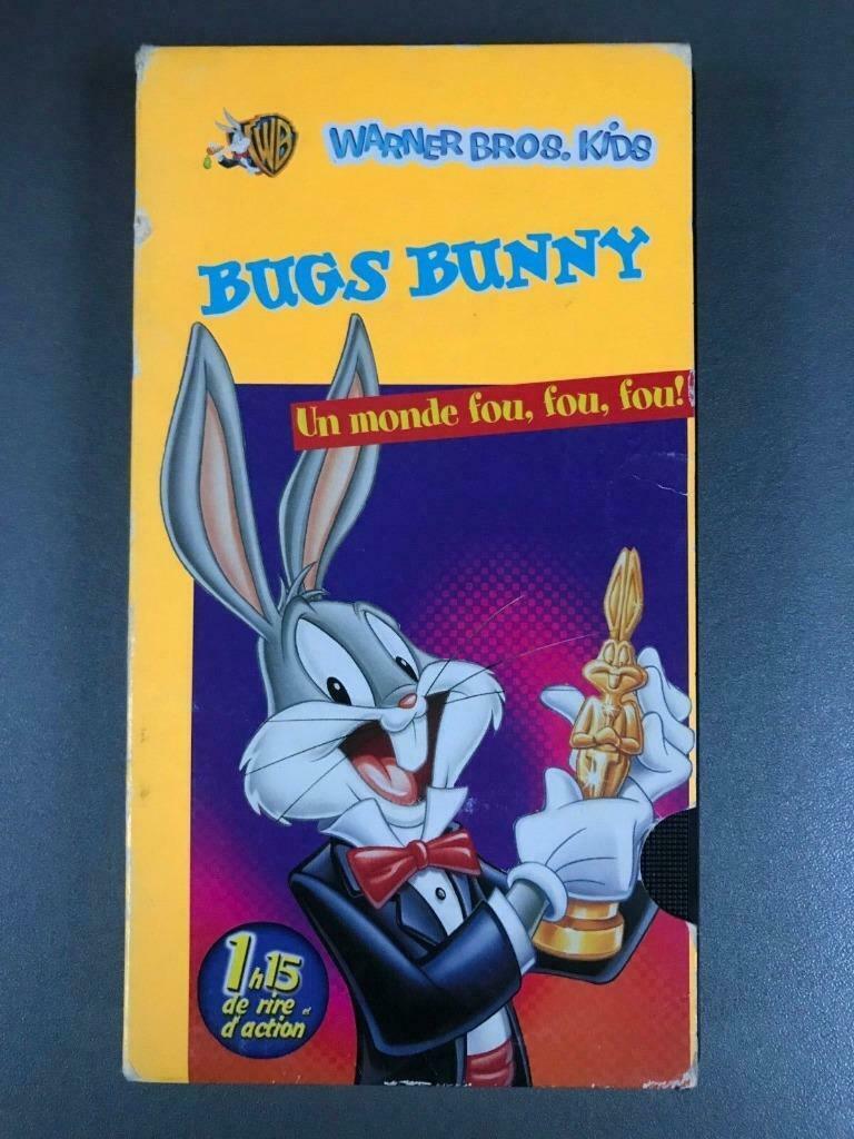 VHS Bugs Bunny : Un monde fou, fou, fou! -, Enlèvement ou Envoi, Dessin animé, Tous les âges, Utilisé