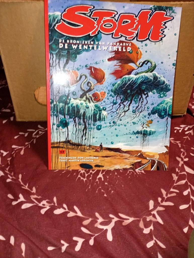 Couverture souple en couleur non lue de la série, STORM,, Une BD, Enlèvement ou Envoi, Comme neuf, Don Lawrence