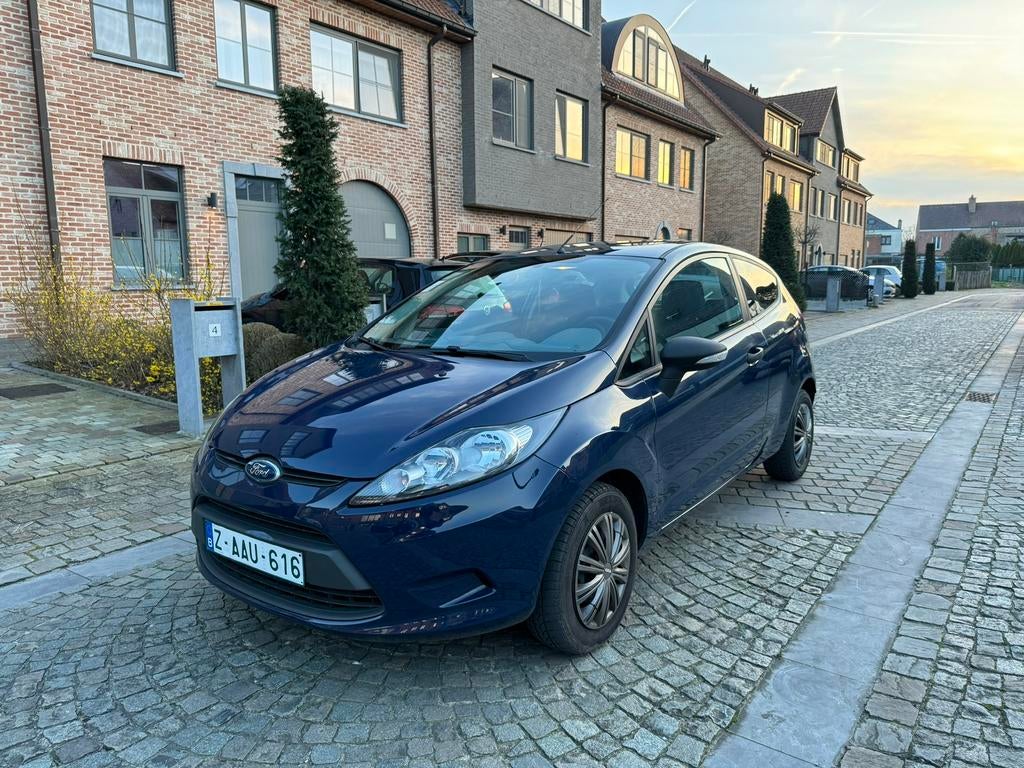 Ford Fiesta / 1.2 benzine / 06-2009 / 119000 km / servo, Auto's, Stof, Parkeersensor, Blauw, 124 g/km