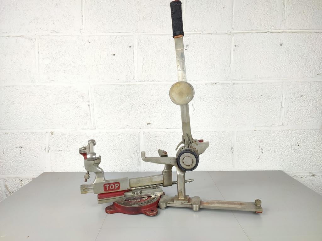 Machine voor spannen snaren tennisraket, Enlèvement