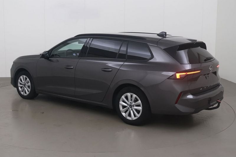 Opel Astra Sports Tourer turbo edition 110, Auto's, Gebruikt, Euro 6, 1199 cc, Overige bekleding