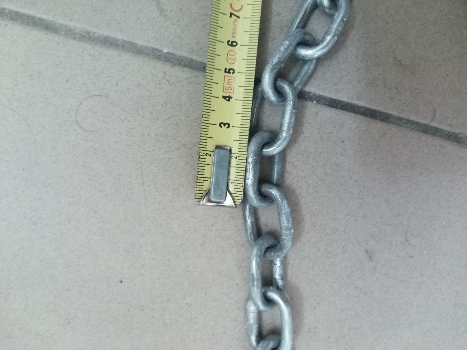 metalen schakelketting, Ophalen