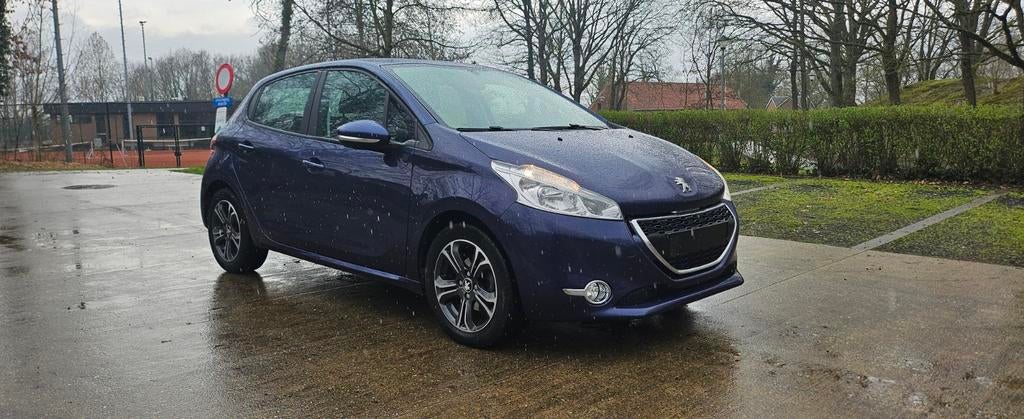 Peugeot 208 1.2 Benzine Bj.2014 Met 81.000 Km, Auto's, Voorwielaandrijving, Stof, Parkeersensor, Blauw