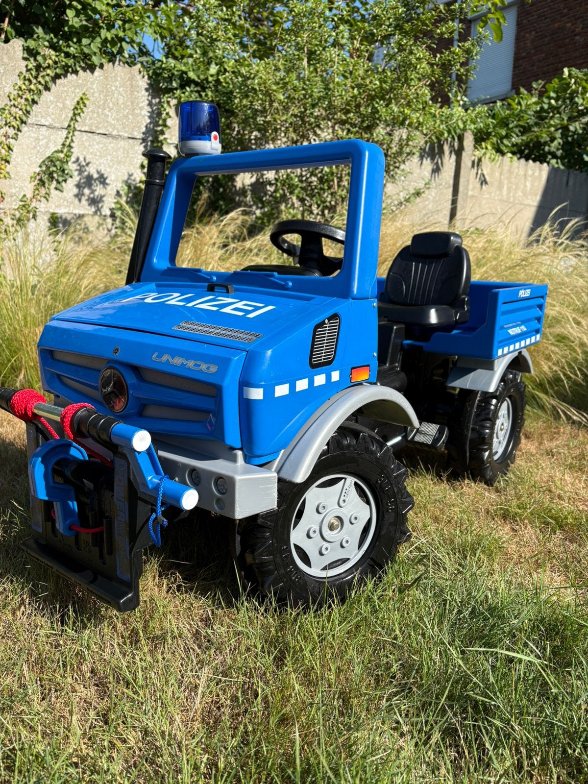 Rolly Toys Unimog Politie / Zwaailicht en winch, Kinderen en Baby's, Ophalen, Zo goed als nieuw, Trapvoertuig