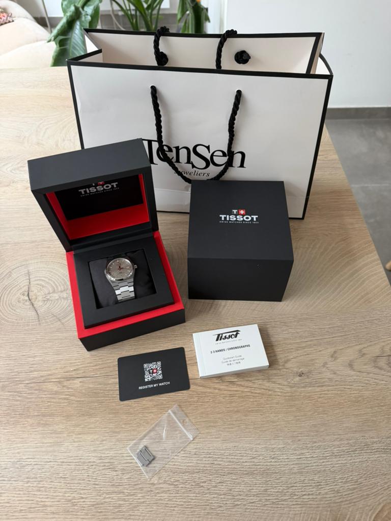 Tissot PRX Powermatic 80 titanium, Montre-bracelet, Autres marques, Enlèvement ou Envoi, Comme neuf