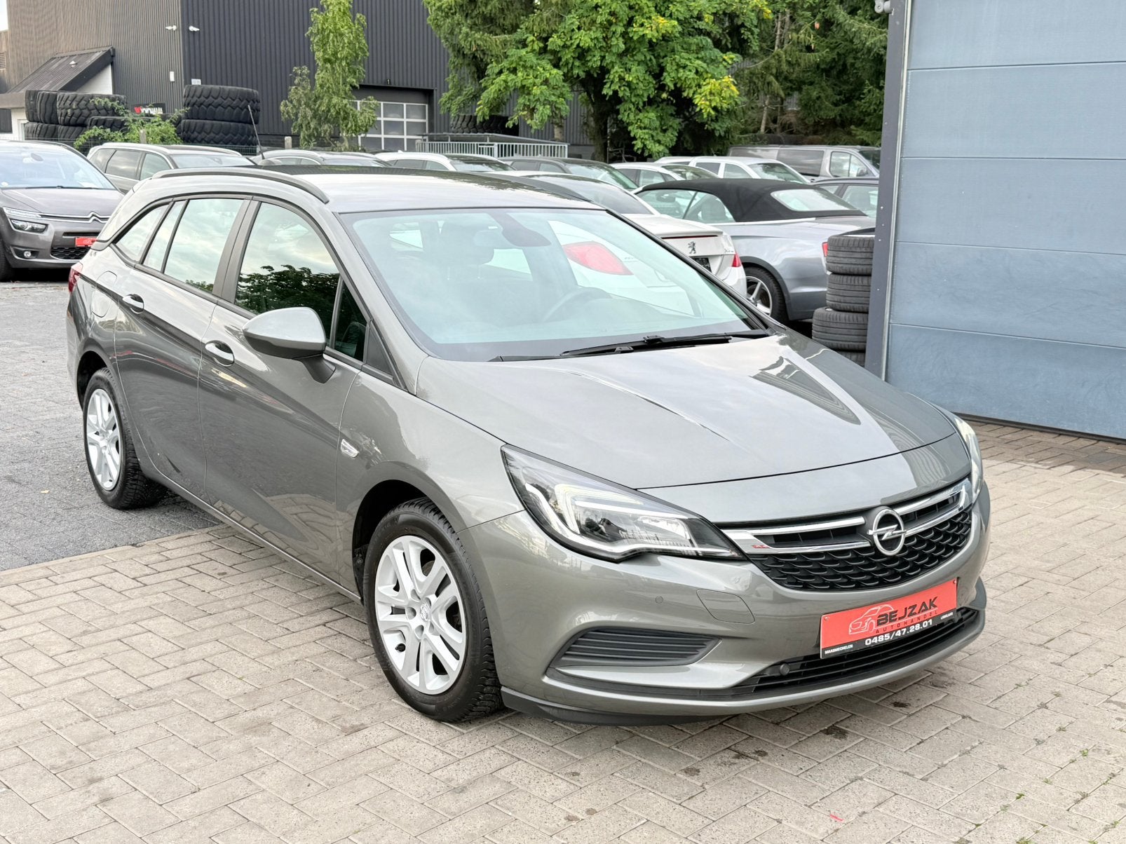 Opel Astra Sports Tourer 1.0i Turbo 37.000km 1j garantie, Auto's, Voorwielaandrijving, Stof, Euro 6, https://public.car-pass.be/vhr/4d1d2a8a-04c2-4d20-b9f8-22b227696d76