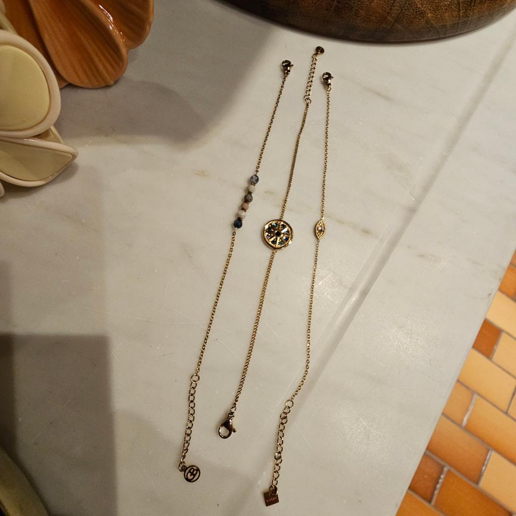 Set van 3 armbandjes. Stainless steel., Staal, Ophalen of Verzenden, Zo goed als nieuw, Met bedels of kralen