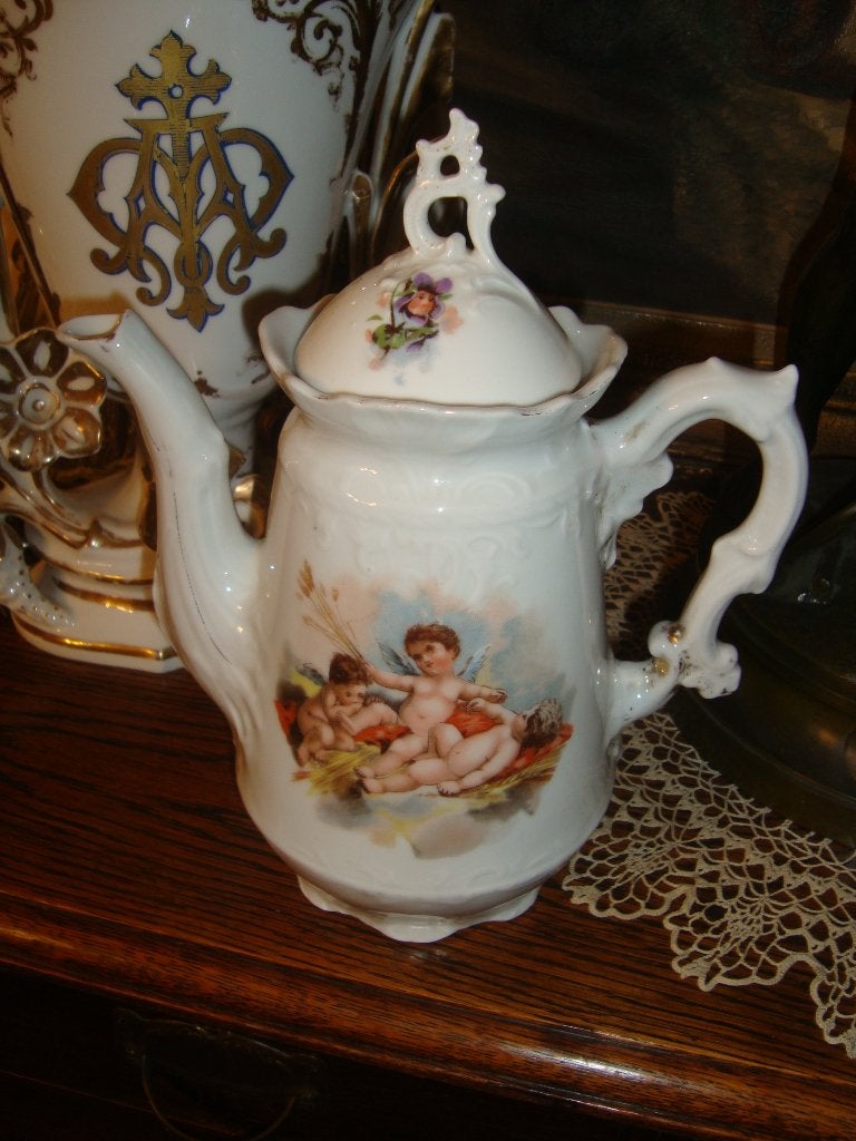 Porseleinen koffiepot. Rond 1900., Ophalen