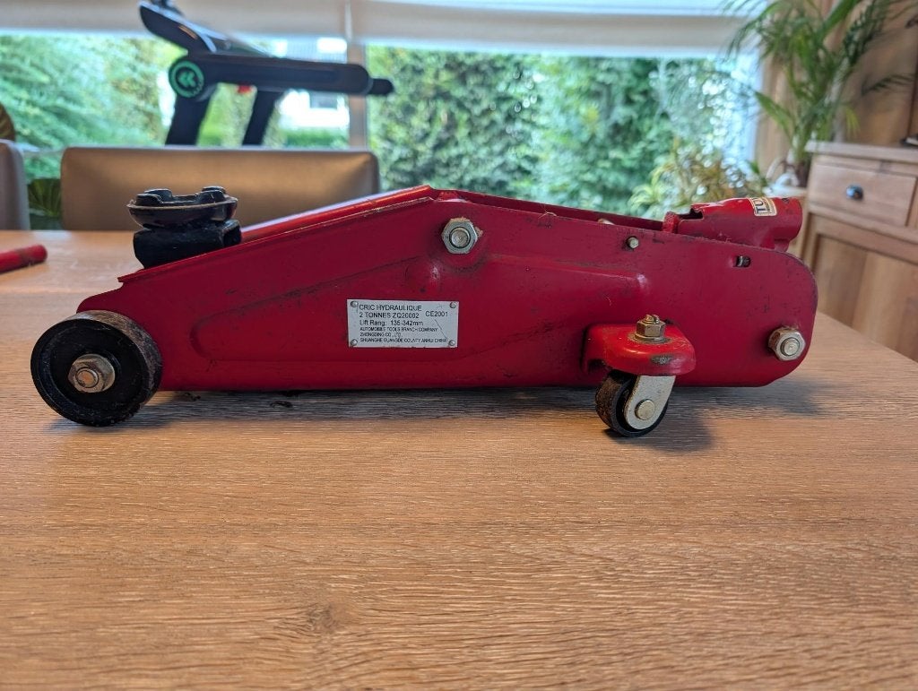 Hydraulische garagekrik 2 ton met kruissleutel en hefstang, Auto diversen, Krikken, Ophalen, Gebruikt, Hydraulisch, Garagekrik