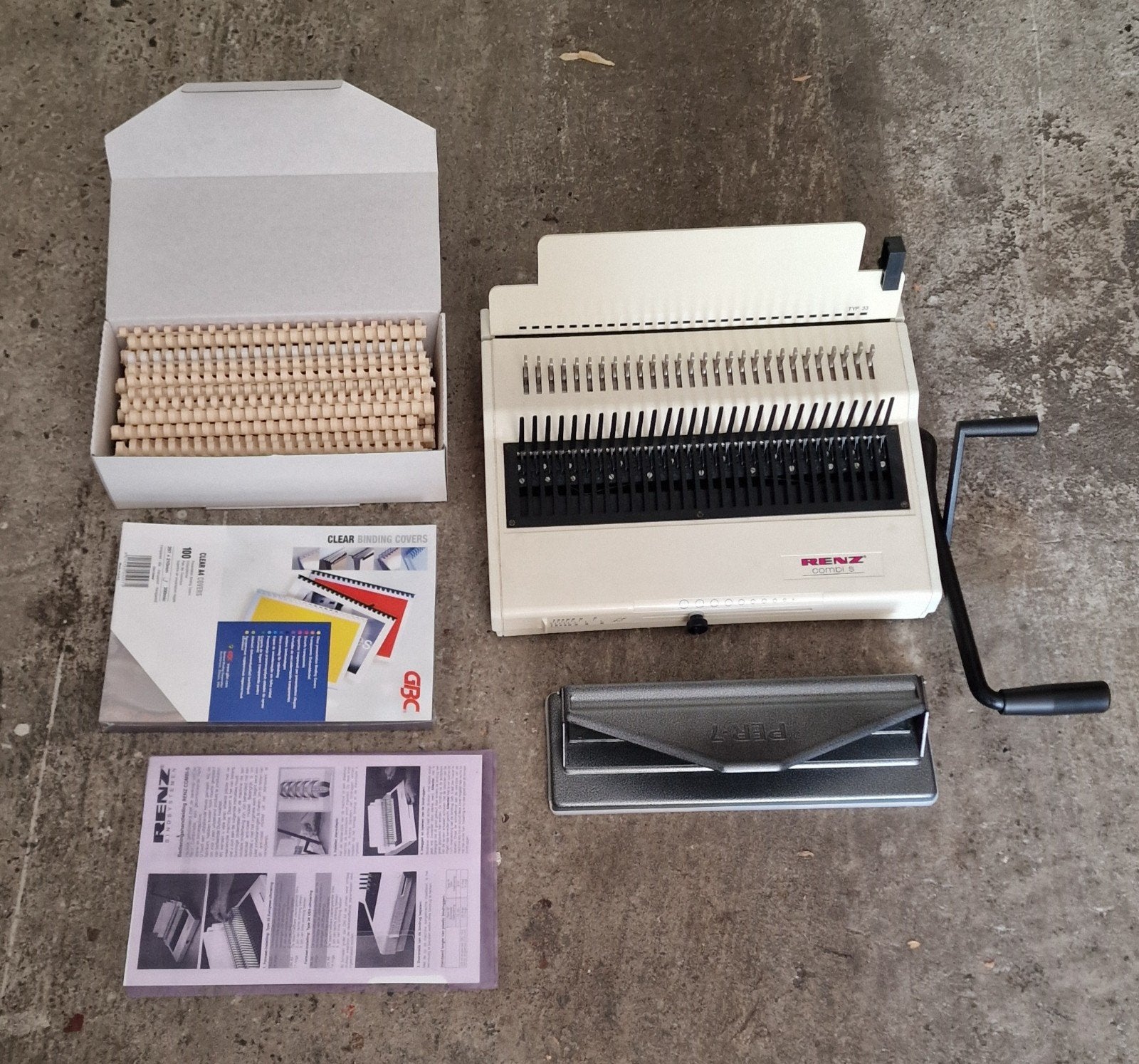 Renz Combi S handmatige inbindmachine (pons- en bindmachine), Enlèvement