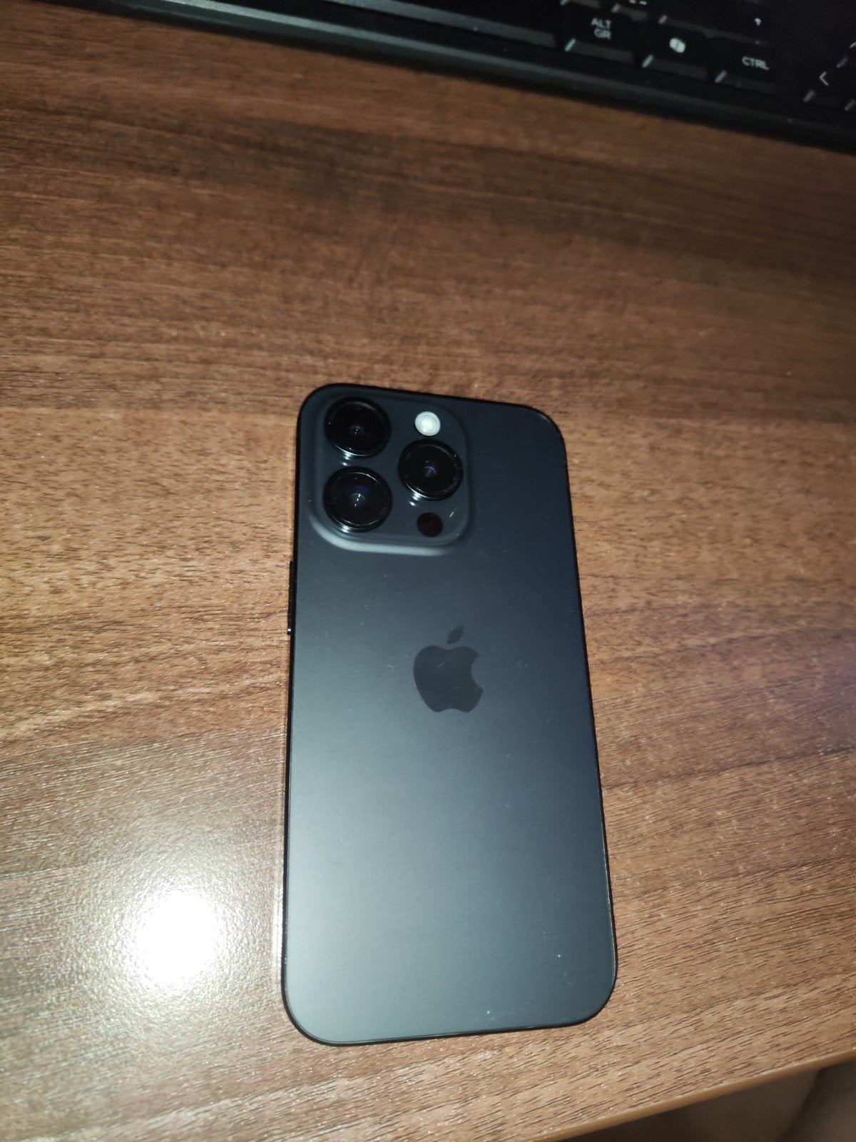 iPhone 15 pro, titanium black 128 Gb, Telecommunicatie, Apple, Californië, Refurbished, Ophalen of Verzenden