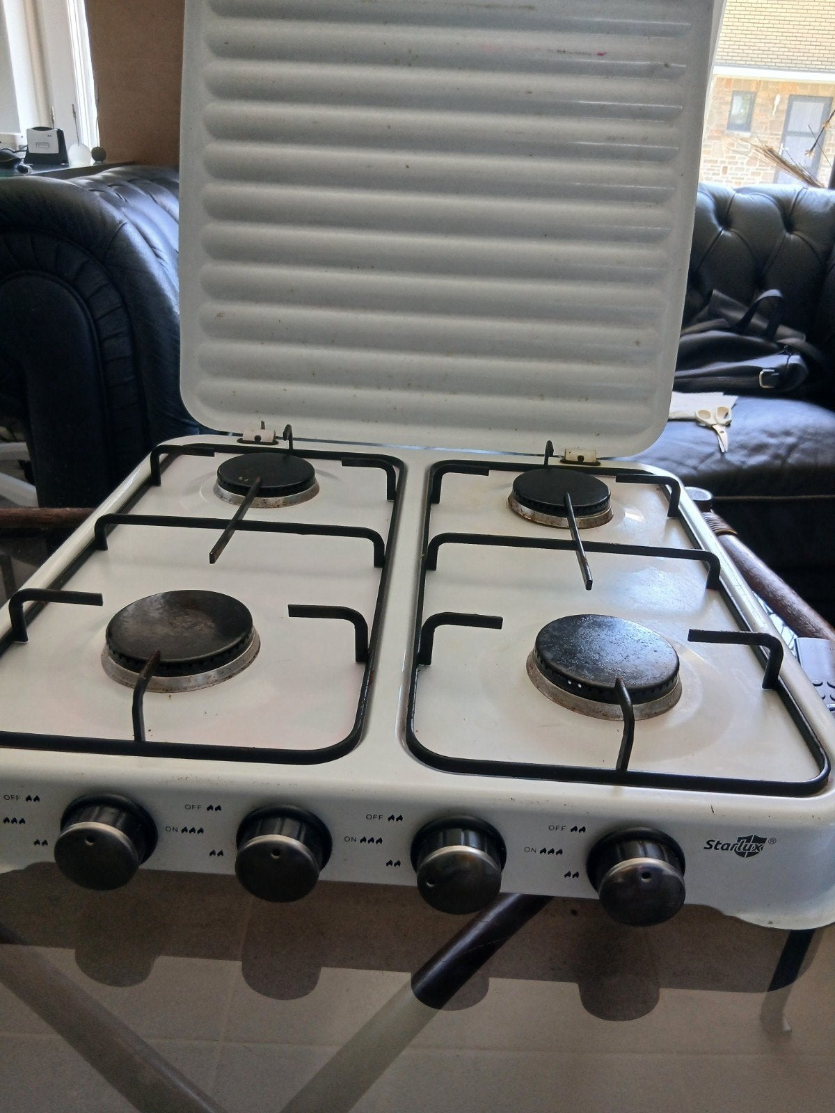 Cuisiniere à gaz, Ophalen